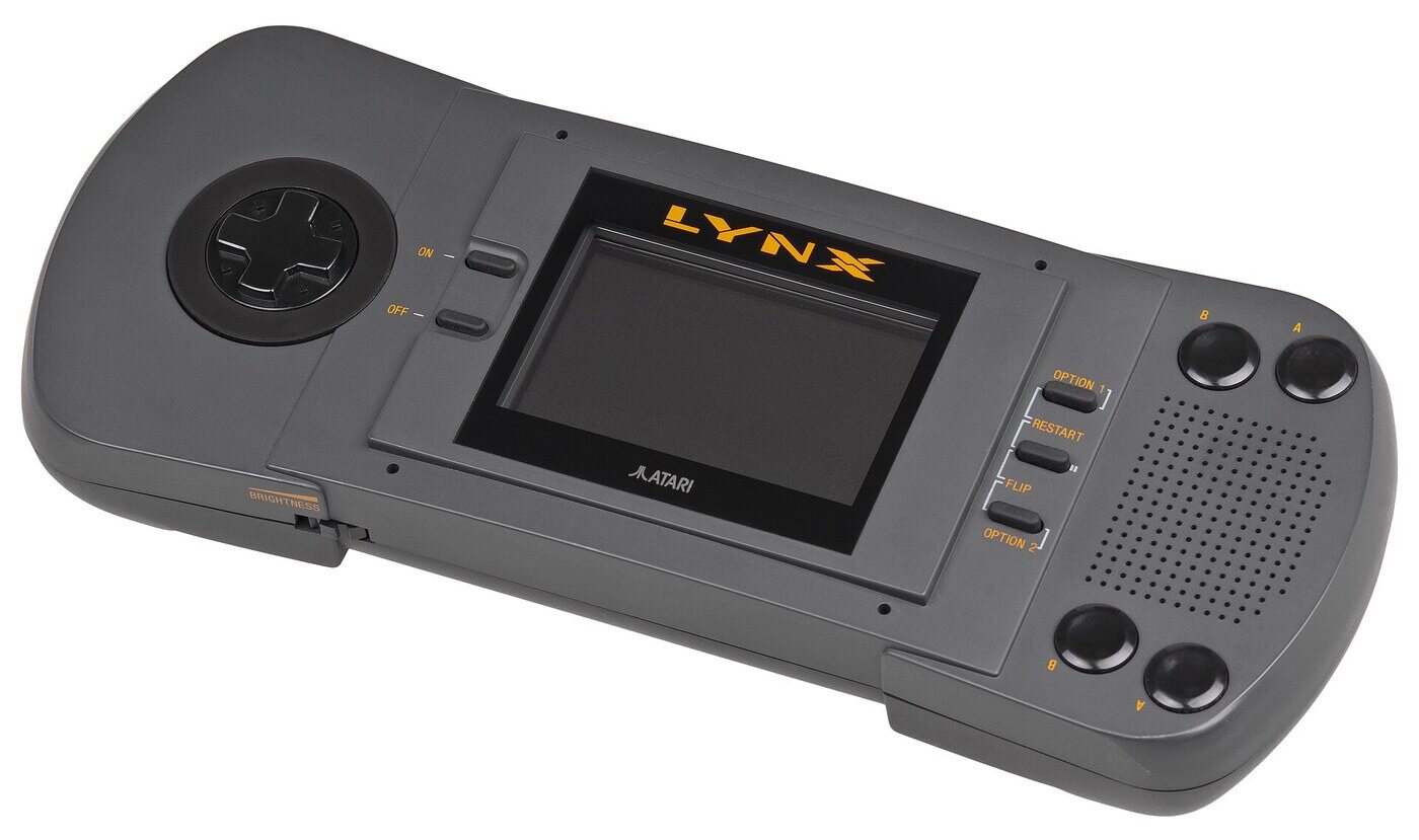The first Atari Lynx of 1989, the large model designed at Epyx, with its 3.5-inch backlit colour screen and the flip button for left-handed play.