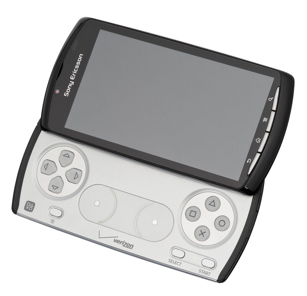 The Xperia Play slid open: the PlayStation d-pad and face buttons and the two flat touch pads that stood in for analogue sticks.