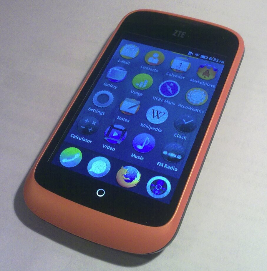 The ZTE Open, the first Firefox OS phone, on the version 1.0 home screen.
